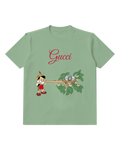 Sage Green Pinocchio Extends Long Nose Toward Nest Graphic T-Shirt - front product view