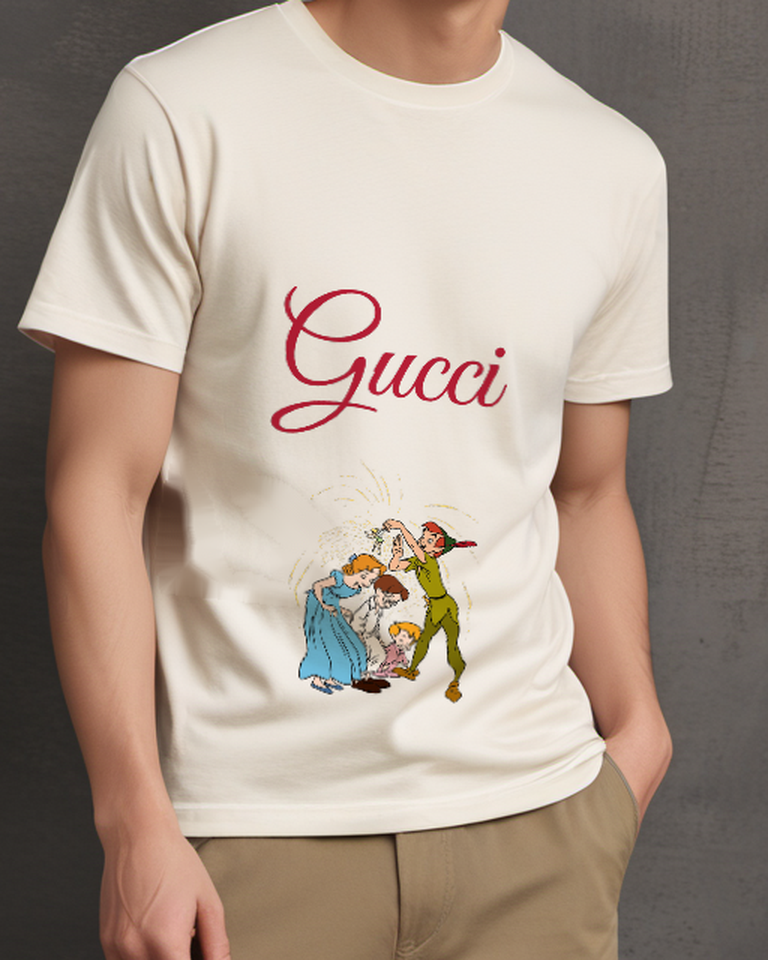 Ivory Peter Pan Arms Raised Holds Tiny Figure Graphic T-Shirt - model wearing view