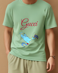 Sage Green Blue Genie Leaps With Carpet Graphic T-Shirt - model wearing view