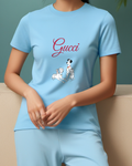Sky Blue Dalmatian Parents With Puppy On Back Graphic T-Shirt - model wearing view