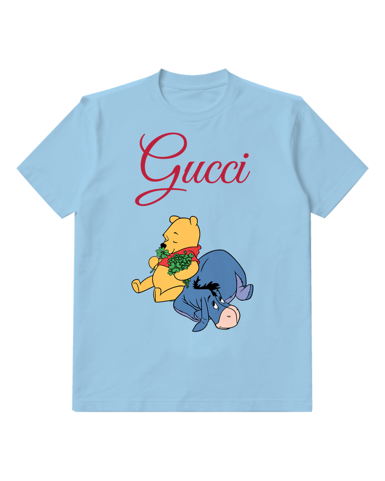 Sky Blue Pooh Holds Shamrocks While Eeyore Lies Down Graphic T-Shirt - front product view