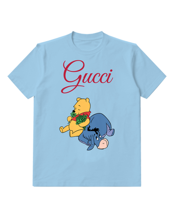 Sky Blue Pooh Holds Shamrocks While Eeyore Lies Down Graphic T-Shirt - front product view