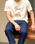 White Dumbo And Mouse In Playful Stance Graphic T-Shirt - model wearing view