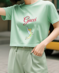 Sage Green Green Fairy Kneeling In Flight Graphic T-Shirt - model wearing view