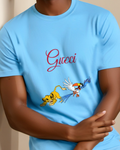 Sky Blue Young Lion Cub Lunges Forward Graphic T-Shirt - model wearing view