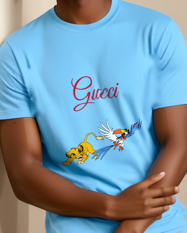 Sky Blue Young Lion Cub Lunges Forward Graphic T-Shirt - model wearing view