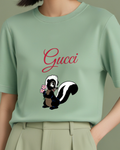Sage Green Skunk Holding Pink Flowers Graphic T-Shirt - model wearing view