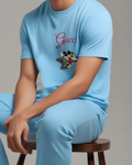 Sky Blue Mickey And Minnie Skating Together Graphic T-Shirt - model wearing view