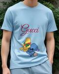 Sky Blue Pooh Holds Shamrocks While Eeyore Lies Down Graphic T-Shirt - model wearing view
