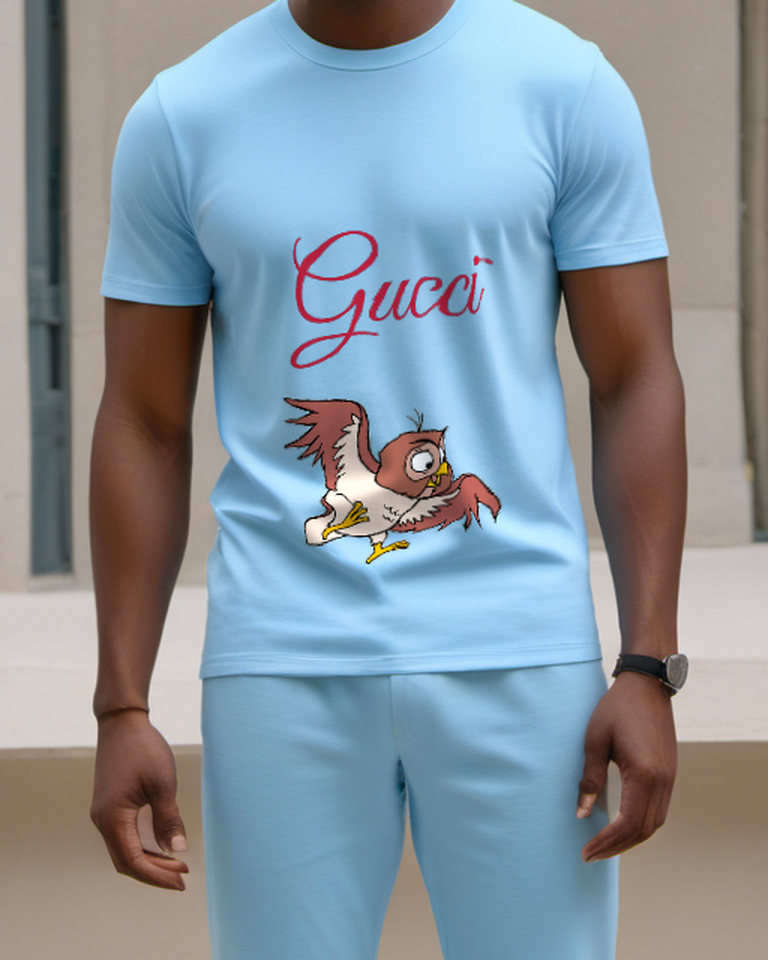 Sky Blue Little Brown Owl Flying Graphic T-Shirt - model wearing view
